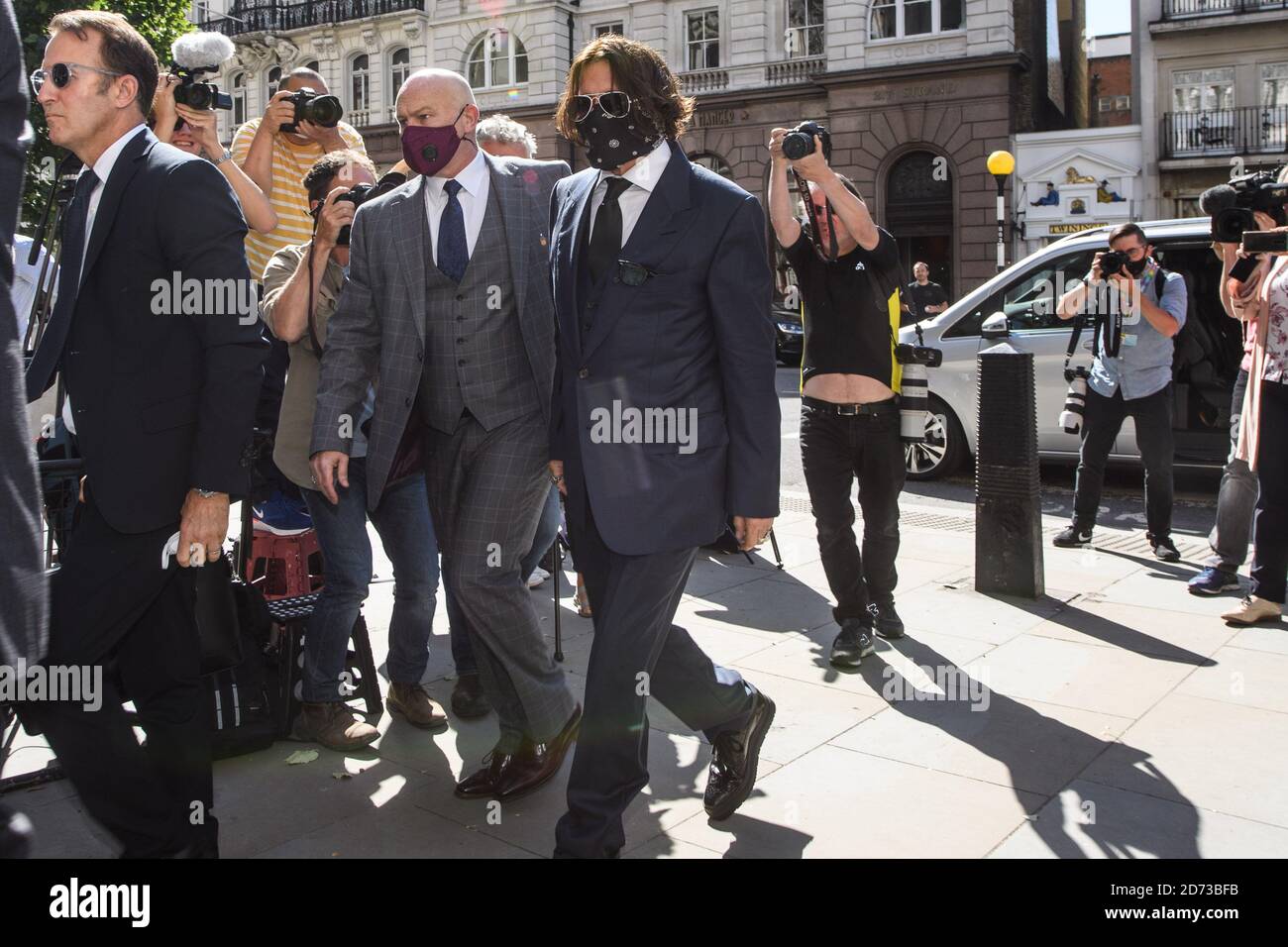Johnny Depp Actor Johnny Depp arriving at the High Court in London for a hearing in his libel case against the publishers of The Sun, and its executive editor, Dan Wootton. Picture date: Tuesday July 7, 2020. Photo credit should read: Matt Crossick/Empics Stock Photo