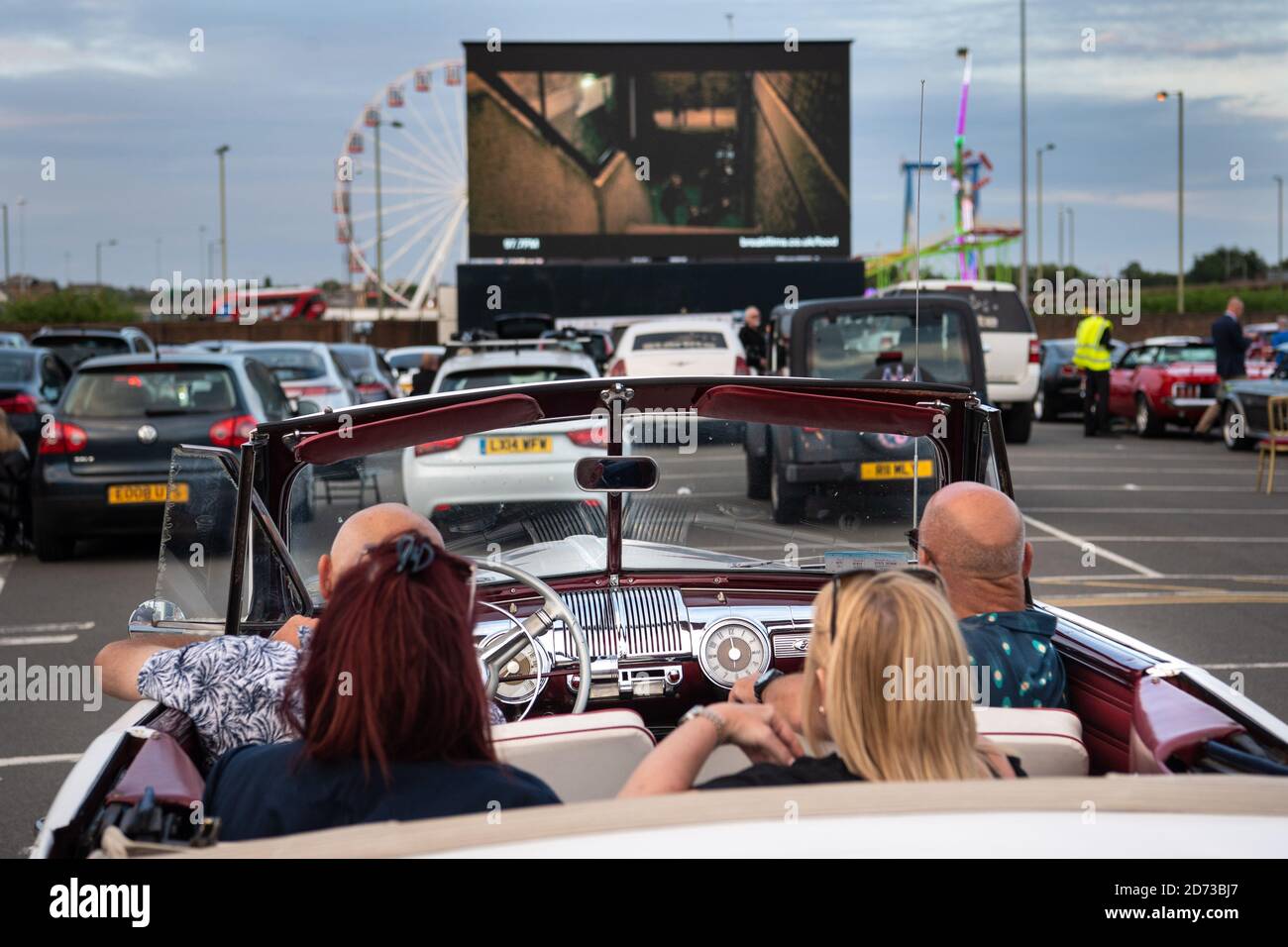 People watch the drive-in premiere of Break, at the Brent Cross Drive-In cinema in north west London. Picture date: Wednesday July 22, 2020. Photo credit should read: Matt Crossick/Empics Stock Photo