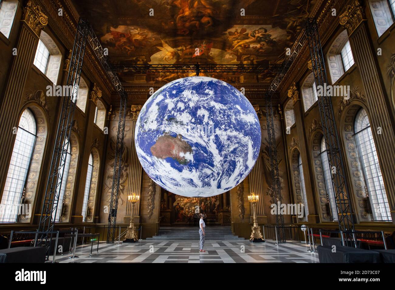 Luke Jerram's artwork Gaia, a replica of planet earth created using detailed NASA imagery of the Earth's surface, goes on display in the Painted Hall of the Old Royal Naval College, Greenwich, London, as part of the 2020 Greenwich+Docklands International Festival. Picture date: Friday August 28, 2020. Photo credit should read: Matt Crossick/Empics Stock Photo