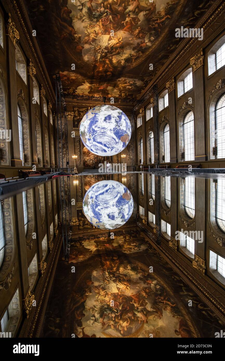 Luke Jerram's artwork Gaia, a replica of planet earth created using detailed NASA imagery of the Earth's surface, goes on display in the Painted Hall of the Old Royal Naval College, Greenwich, London, as part of the 2020 Greenwich+Docklands International Festival. Picture date: Friday August 28, 2020. Photo credit should read: Matt Crossick/Empics Stock Photo