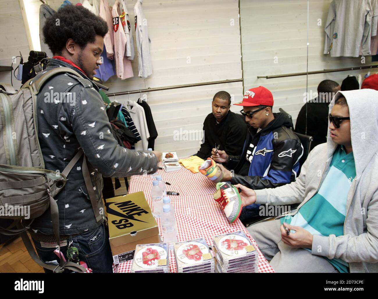 Pharrell Williams of N.E.R.D signs copies of new album Seeing Sounds at the Hideout store in Soho, London. Stock Photo