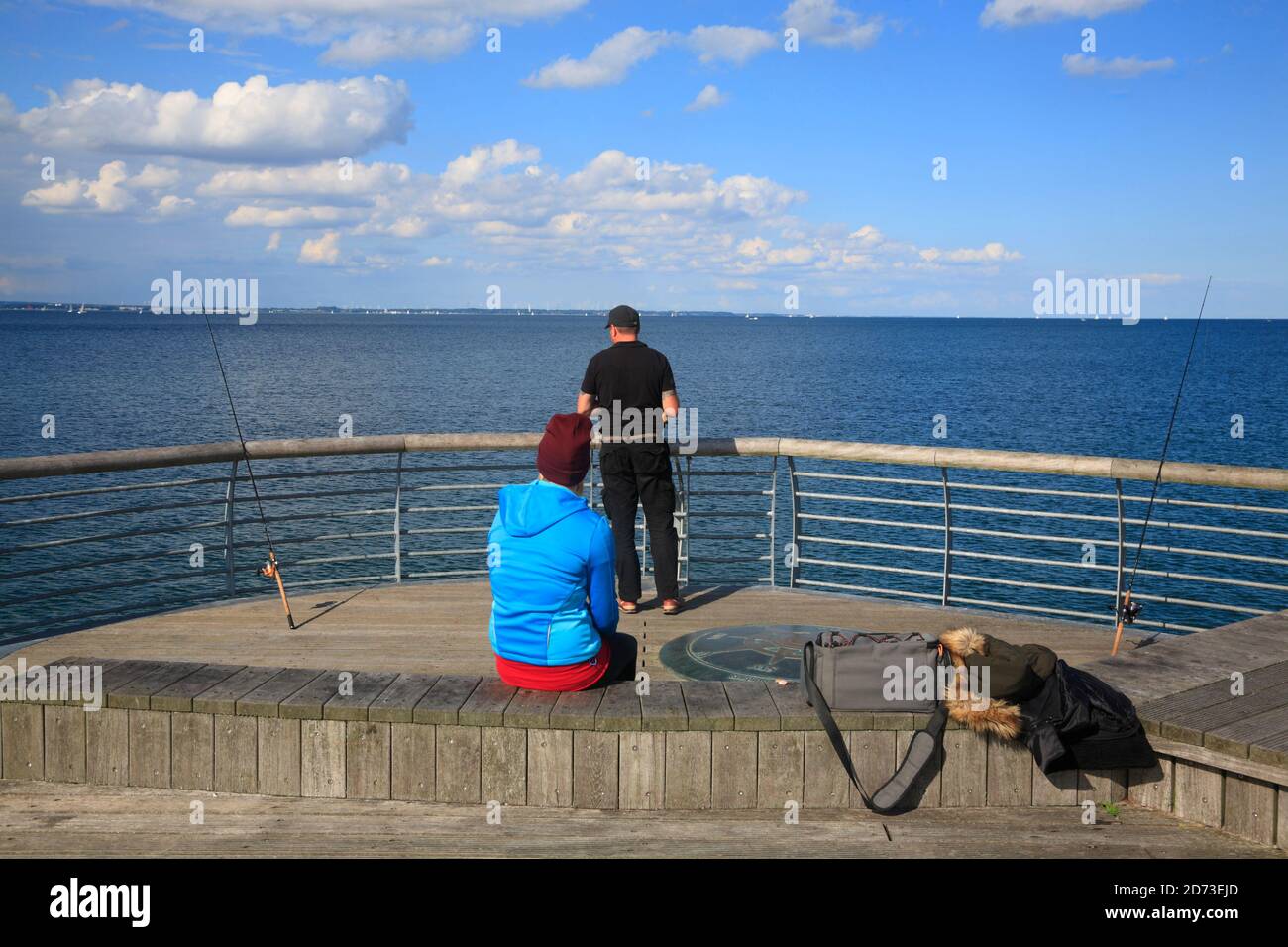 Fishing from the pier in Niendorf / Ostsee,   Timmendorfer Strand, Schleswig-Holstein, Germany, Europe Stock Photo