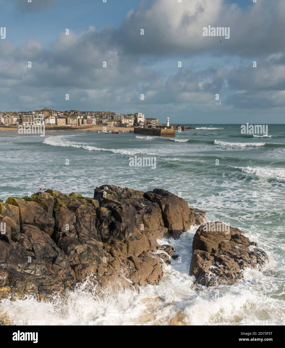Rough winter seas hitting the harbour in St Ives, Cornwall, UK Stock ...