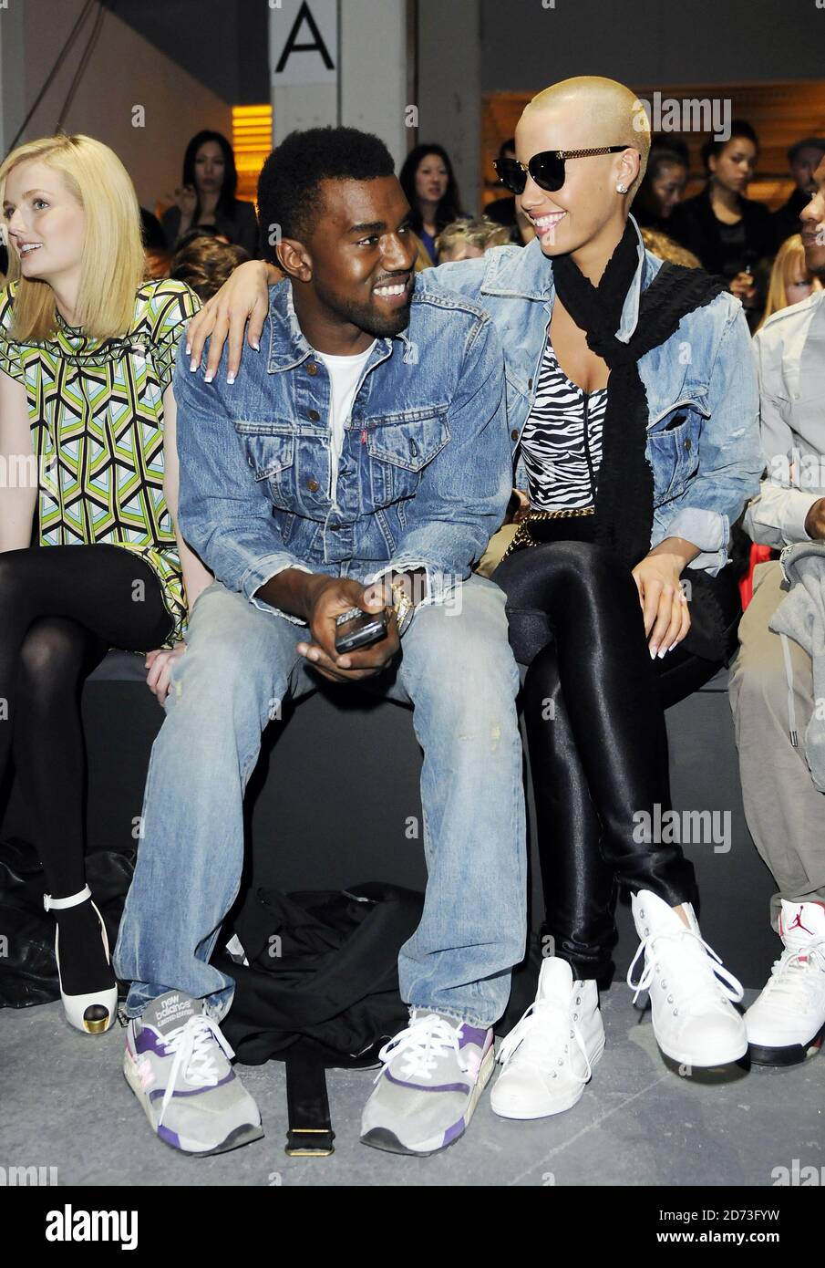 Kanye West and girlfriend Amber Rose attending the Peter Jensen fashion show, held at Westminster University in central London, as part of the 2009 London Fashion Week. Stock Photo
