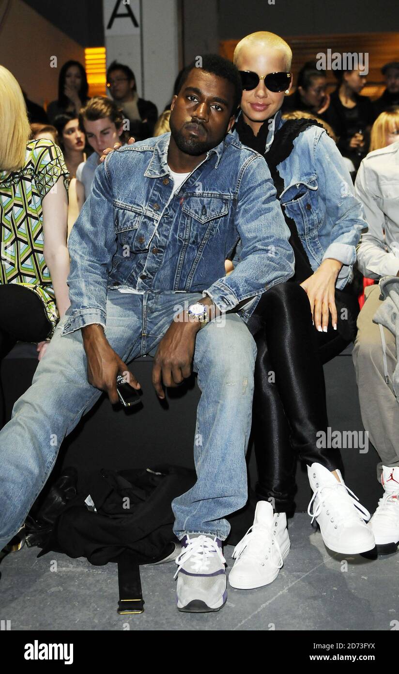Kanye West and girlfriend Amber Rose attending the Peter Jensen fashion show, held at Westminster University in central London, as part of the 2009 London Fashion Week. Stock Photo