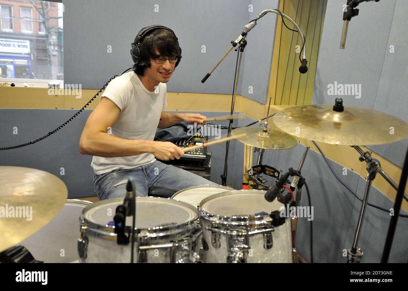 Matt Tong of Bloc Party recording at Capital Radio Live Session at the radio  station's studio in Leicester Square, central London Stock Photo - Alamy
