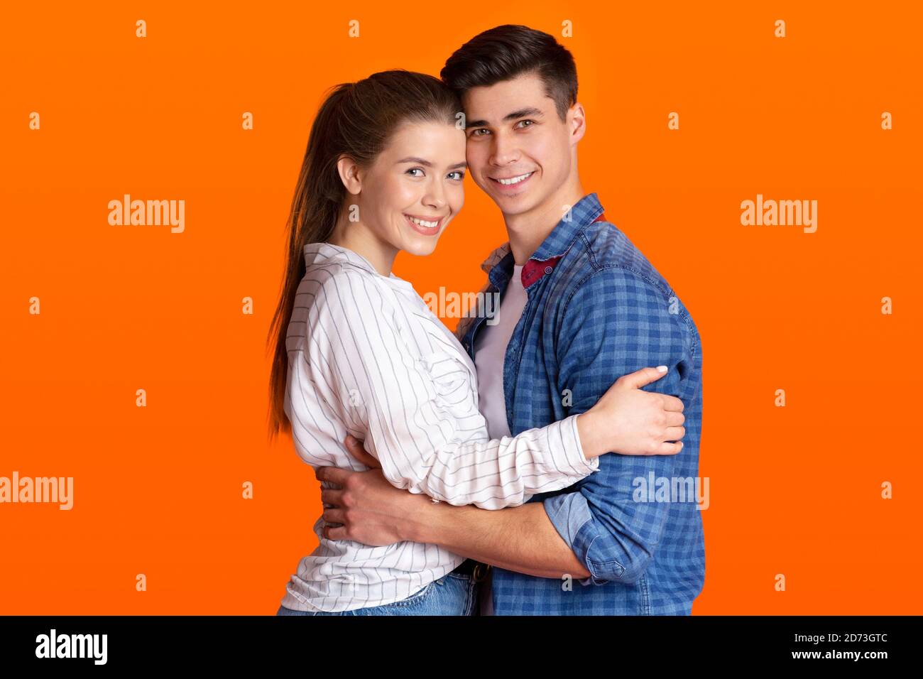 Beautiful happy couple in love and real feelings in relationships Stock Photo
