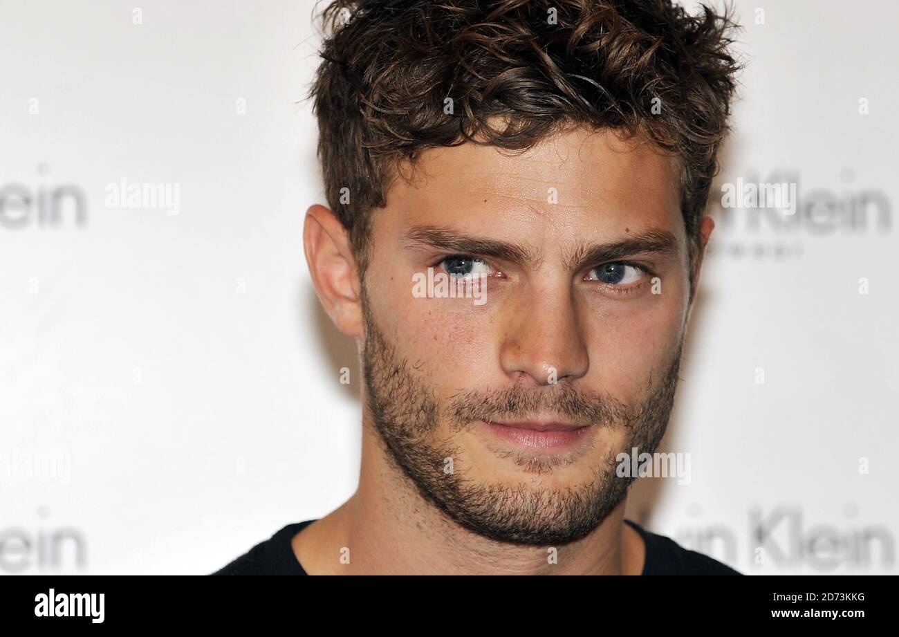 Jamie Dornan poses for photographs at the House of Fraser on Oxford St, London, to promote Calvin Klein's '9 Countries, 9 Men, 1 Winner' male model competition. Stock Photo