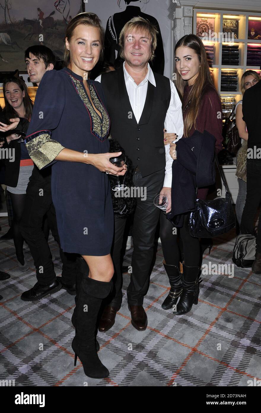 (l-r) Yasmin, Amber and Simon Le Bon attending the launch party for Juicy Couture's flagship store in central London. Stock Photo