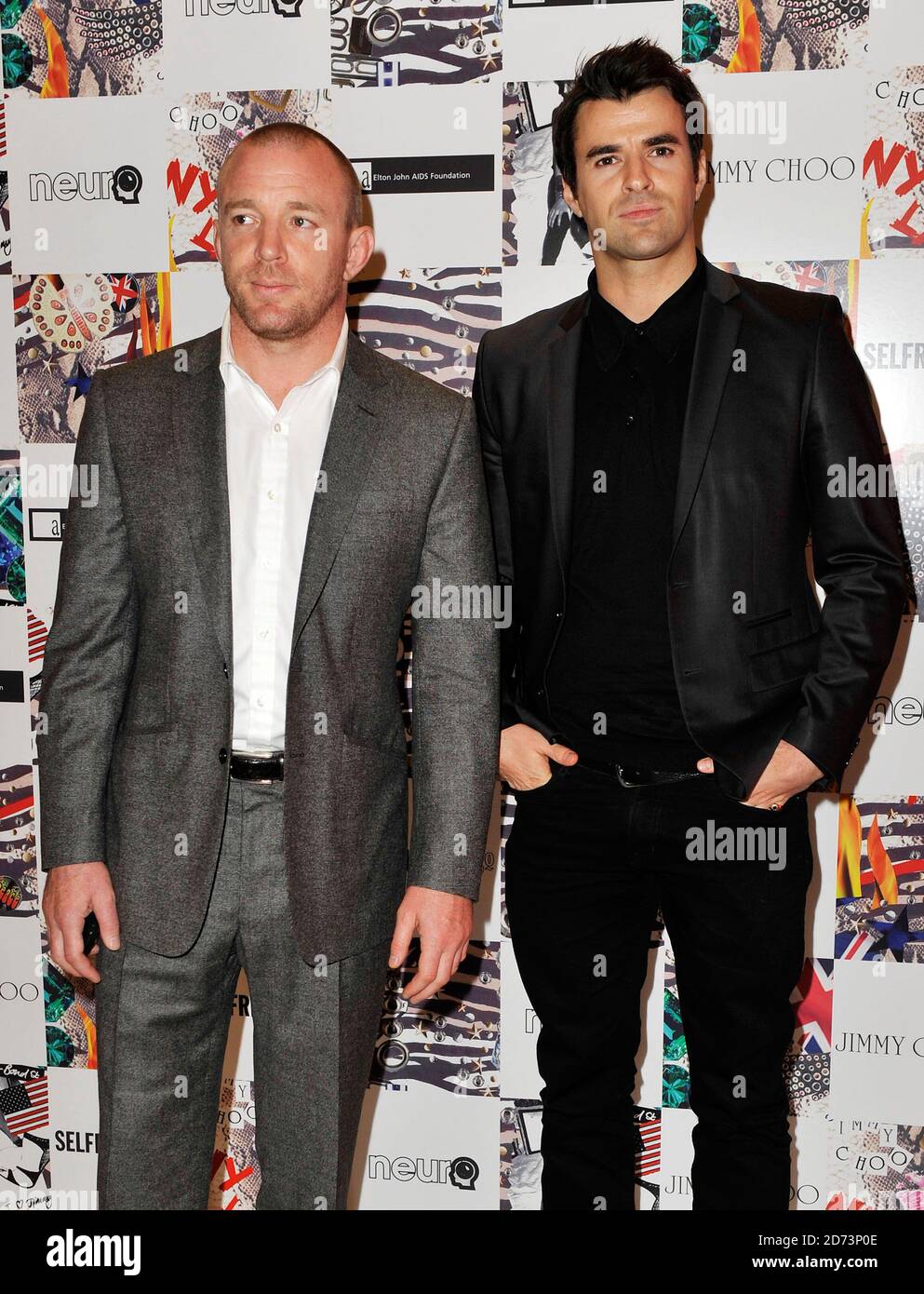 Guy Ritchie l and Steve Jones attending the Jimmy Choo You Your