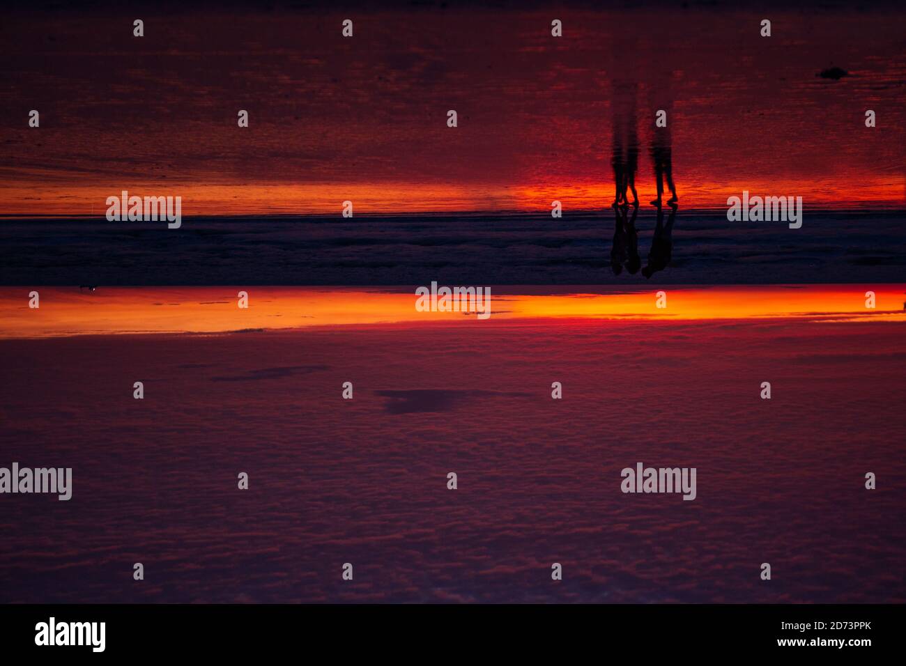 Tropical red sunset with horizon. Benaulim beach, South Goa, India. Stock Photo