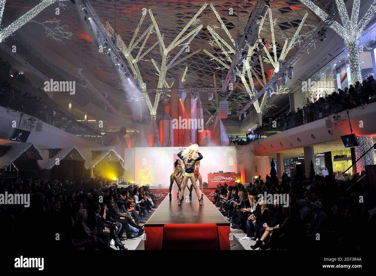 Models on the catwalk during the launch of the new Ed Hardy store in ...