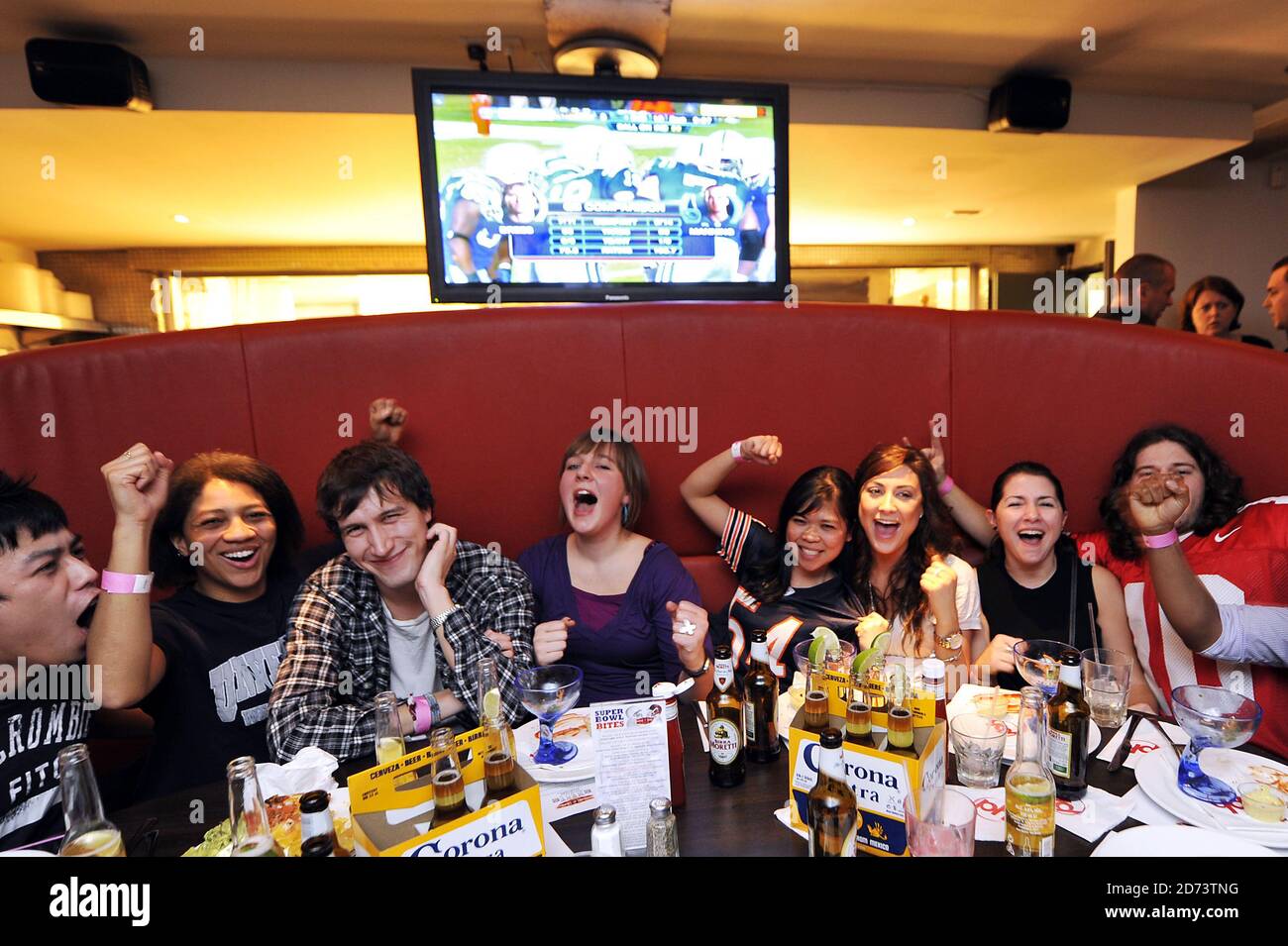 American football fans watch the Superbowl at the Hollywood