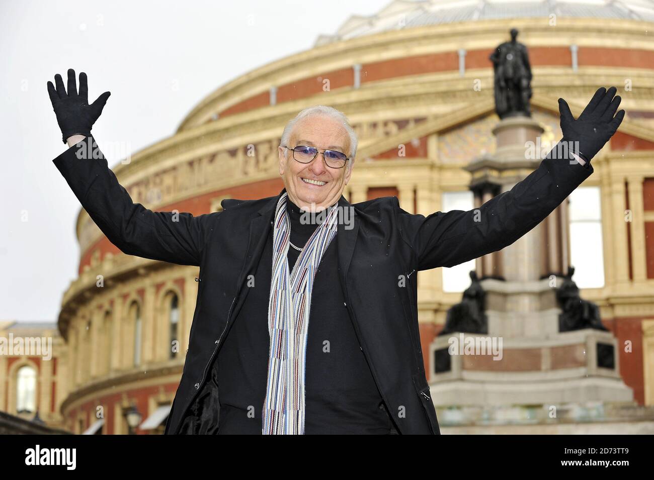 Brian Poole, who is performing in the Solid 60s Silver Show, poses for photographs outside the Royal Albert Hall in central London to launch the 25th anniversary special show. Stock Photo