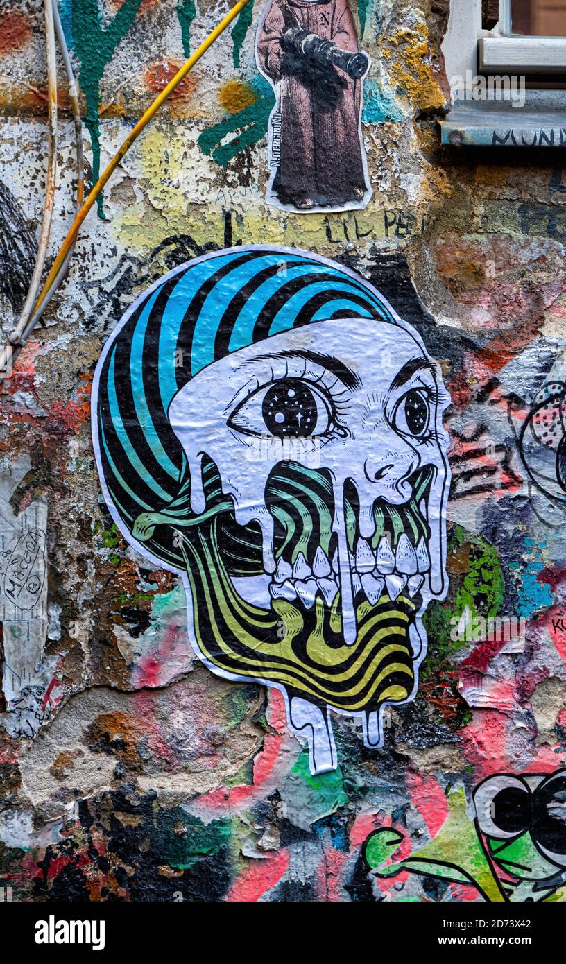 Graffiti & street art on dilapidated wall of Haus Schwarzenberg art & culture venue, 39 Rosenthaler Strasse, Mitte, Berlin. Stock Photo