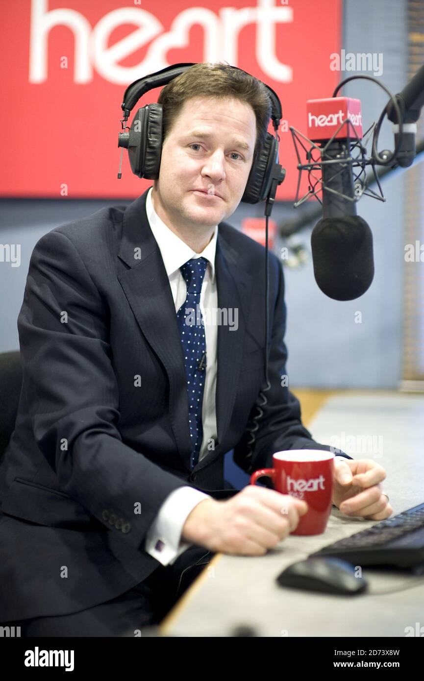 Nick Clegg is interviewed by Jamie Theakston on Heart Breakfast, at the Global Radio studios in central London. Stock Photo