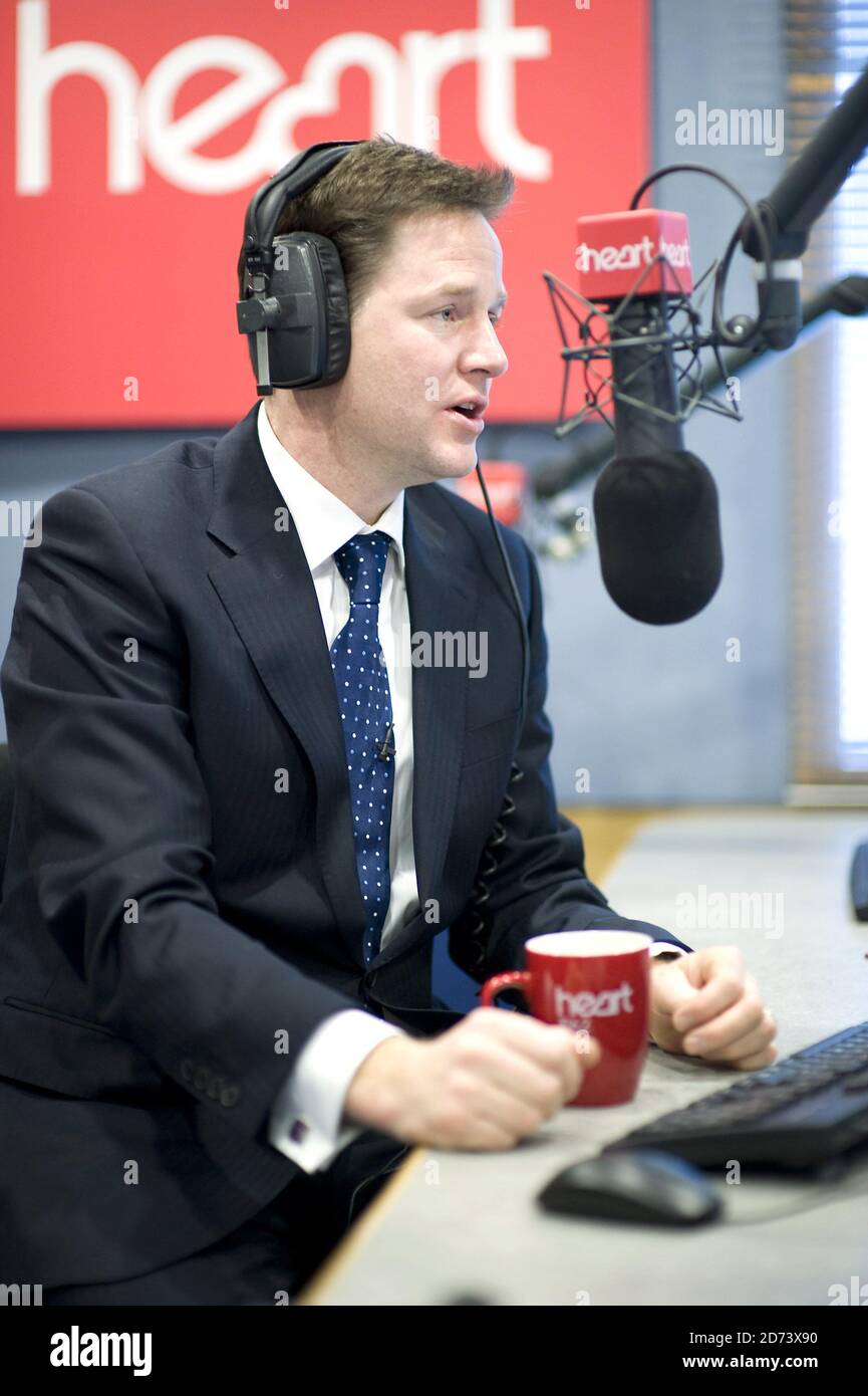 Nick Clegg is interviewed by Jamie Theakston on Heart Breakfast, at the Global Radio studios in central London. Stock Photo