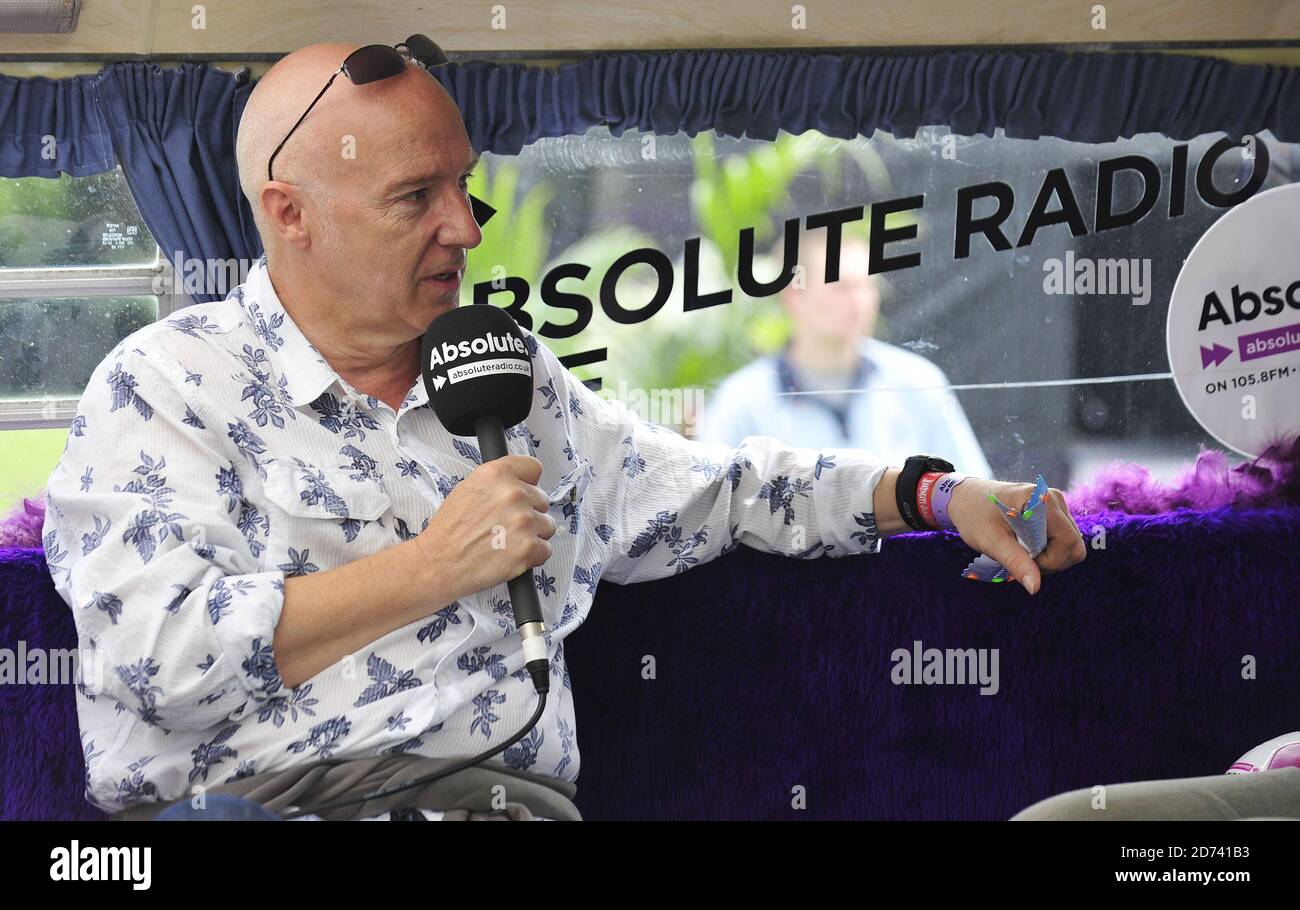 Midge Ure is interviewed by Absolute Radio DJ Geoff Lloyd at the Isle of  Wight festival, in Newport on the Isle of Wight Stock Photo - Alamy