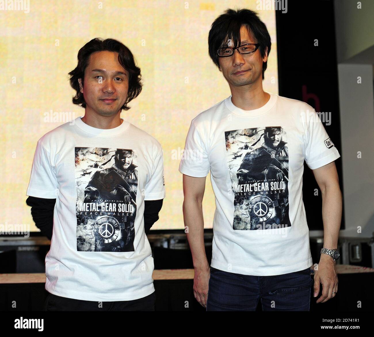 Games designers Yoji Shinkawa (l) and Hideo Kojimo (r) pictured at the launch of Metal Gear Solid Peacewalker, at HMV on Oxford St in central London.  Stock Photo