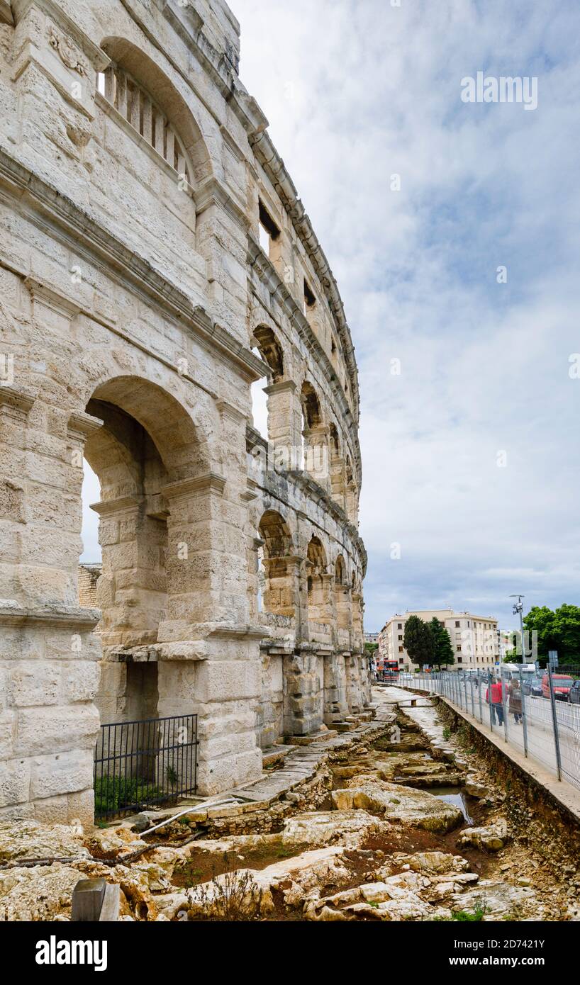 View of the walls and remains of the iconic ancient Roman amphitheatre at Pula, Istria, Croatia, a leading local tourist attraction Stock Photo