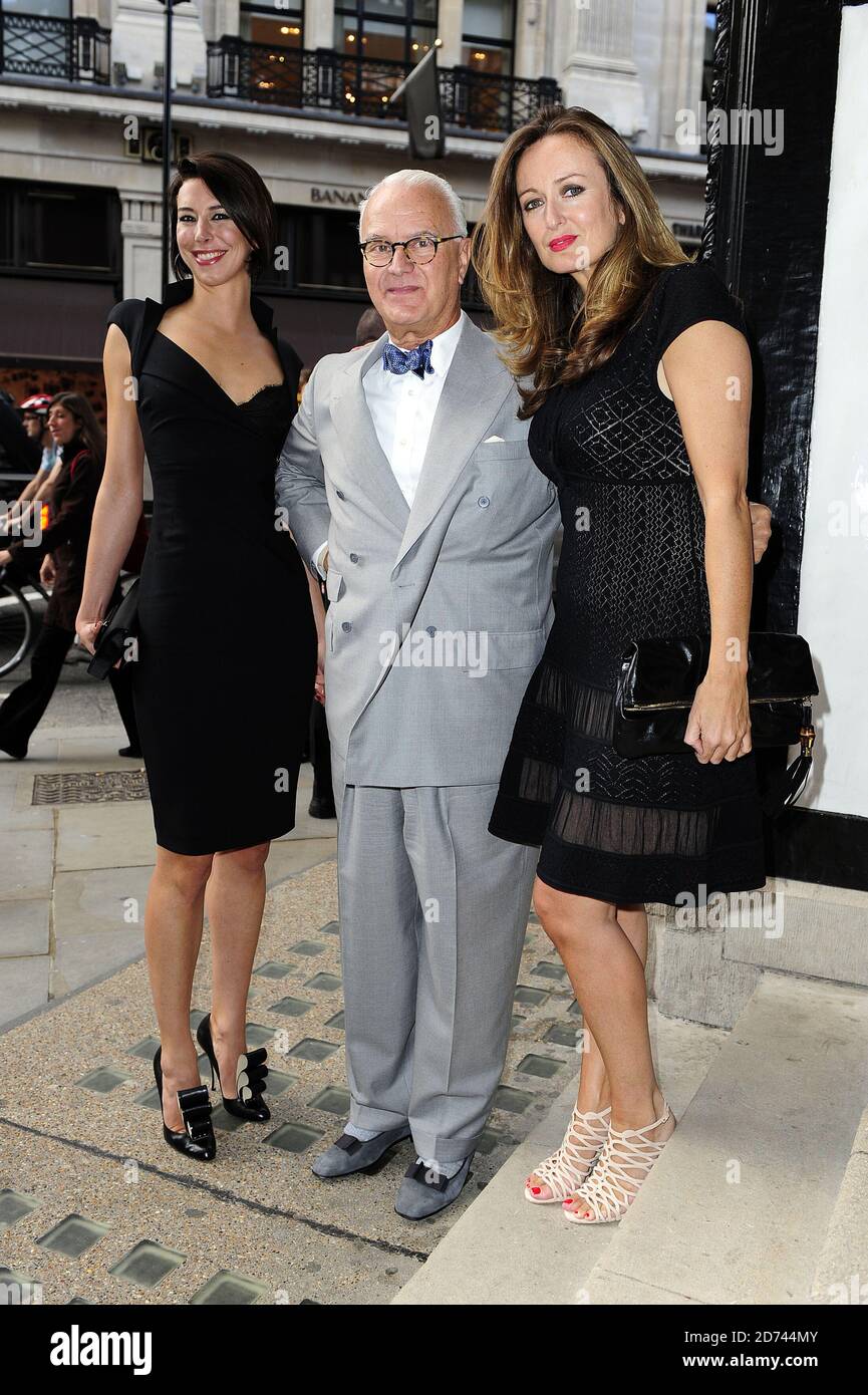 (l-r) Christina Blahnik, Manolo Blahnik, and Lucy Yeomans attending the The World Of Manolo Launch Party, at Liberty in central London.  Stock Photo