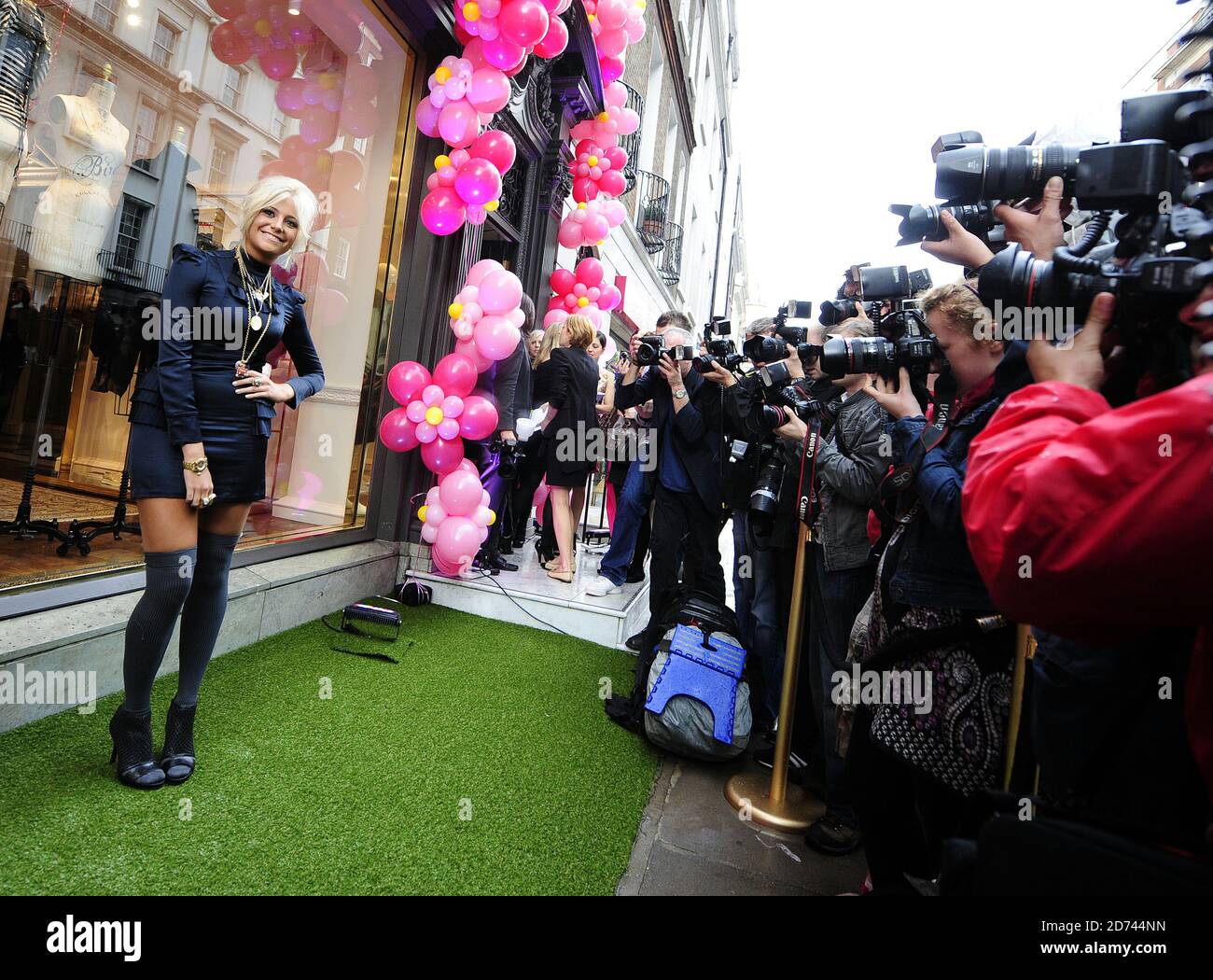 Pixie Lott is pictured outside Juicy Couture's flagship store in central London, as part of Vogue's Fashion's Night Out event which took place in stores across the capital. Stock Photo