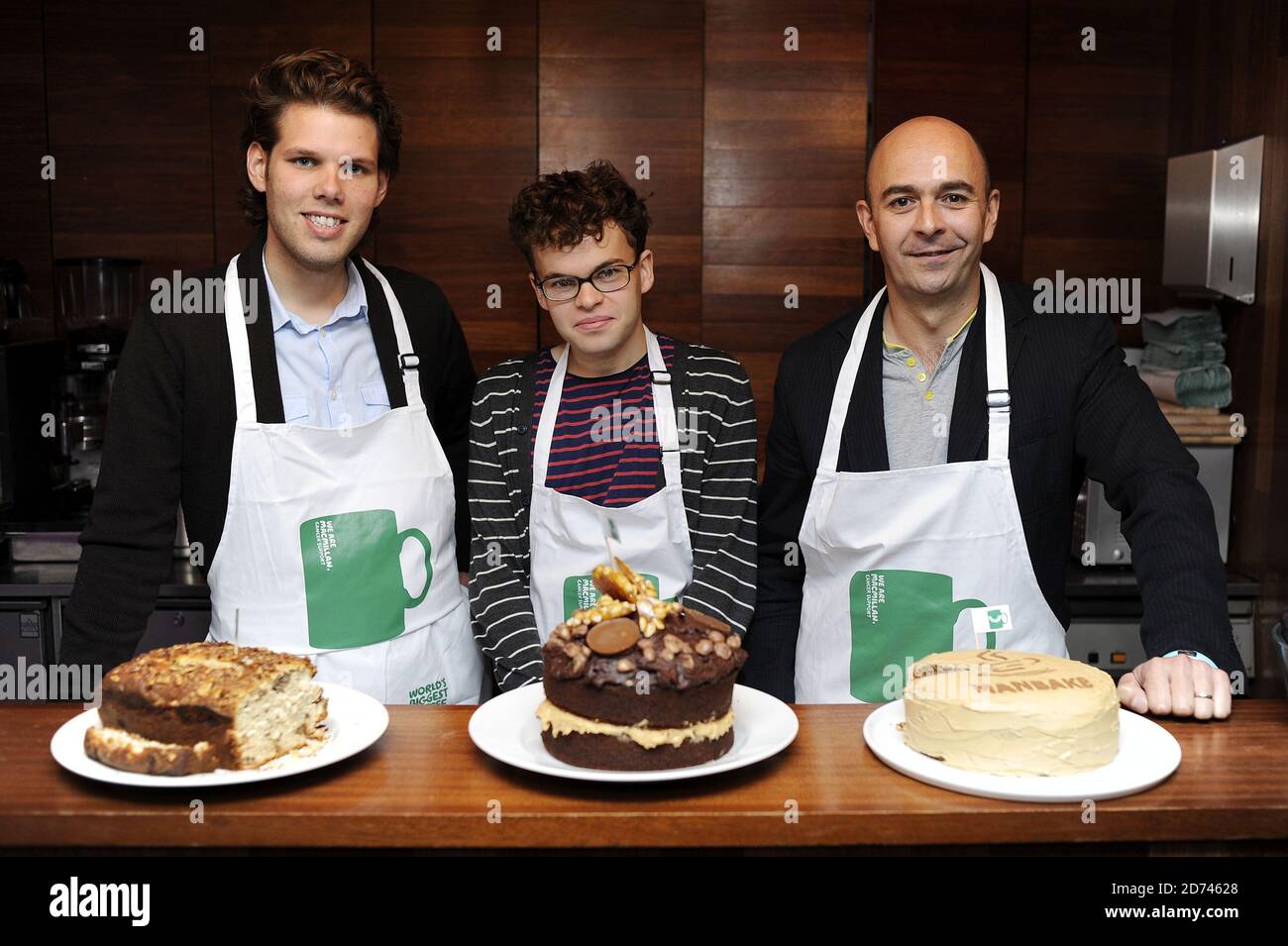 Absolute Radio 'Man bake' competition finalists (l-r) Letting agent Ryan Leahy, Student Luke Boatright and magistrate Philip Newton) pictured with their cake entries at the Absolute Radio studios in central London.  Stock Photo