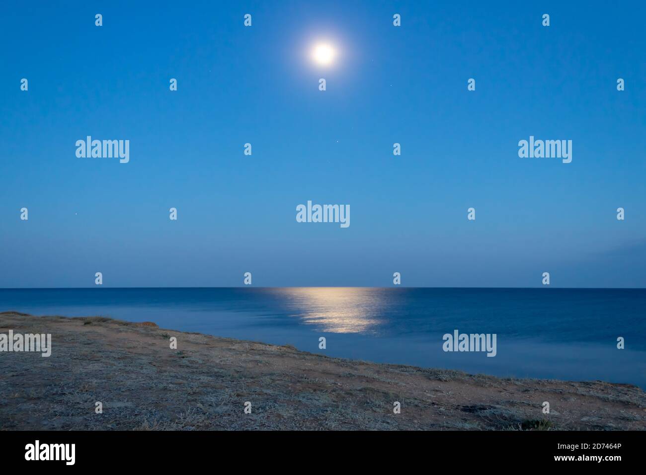 full moon over the sea Stock Photo