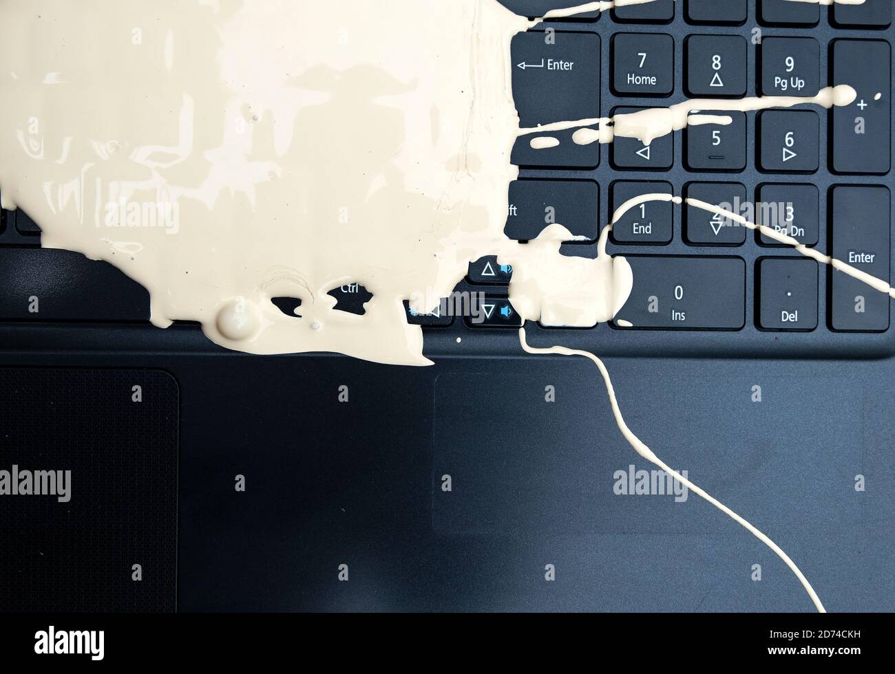 Laptop ruined with spilled paint Stock Photo Alamy