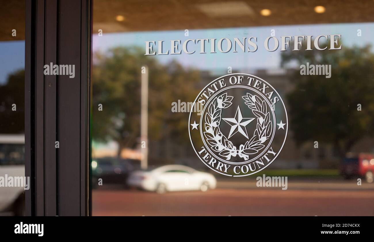 BROWNFIELD, TX - 10/09/2020 - Elections office in Terry County, Texas with the seal of the state. Close up of the entrance door Stock Photo