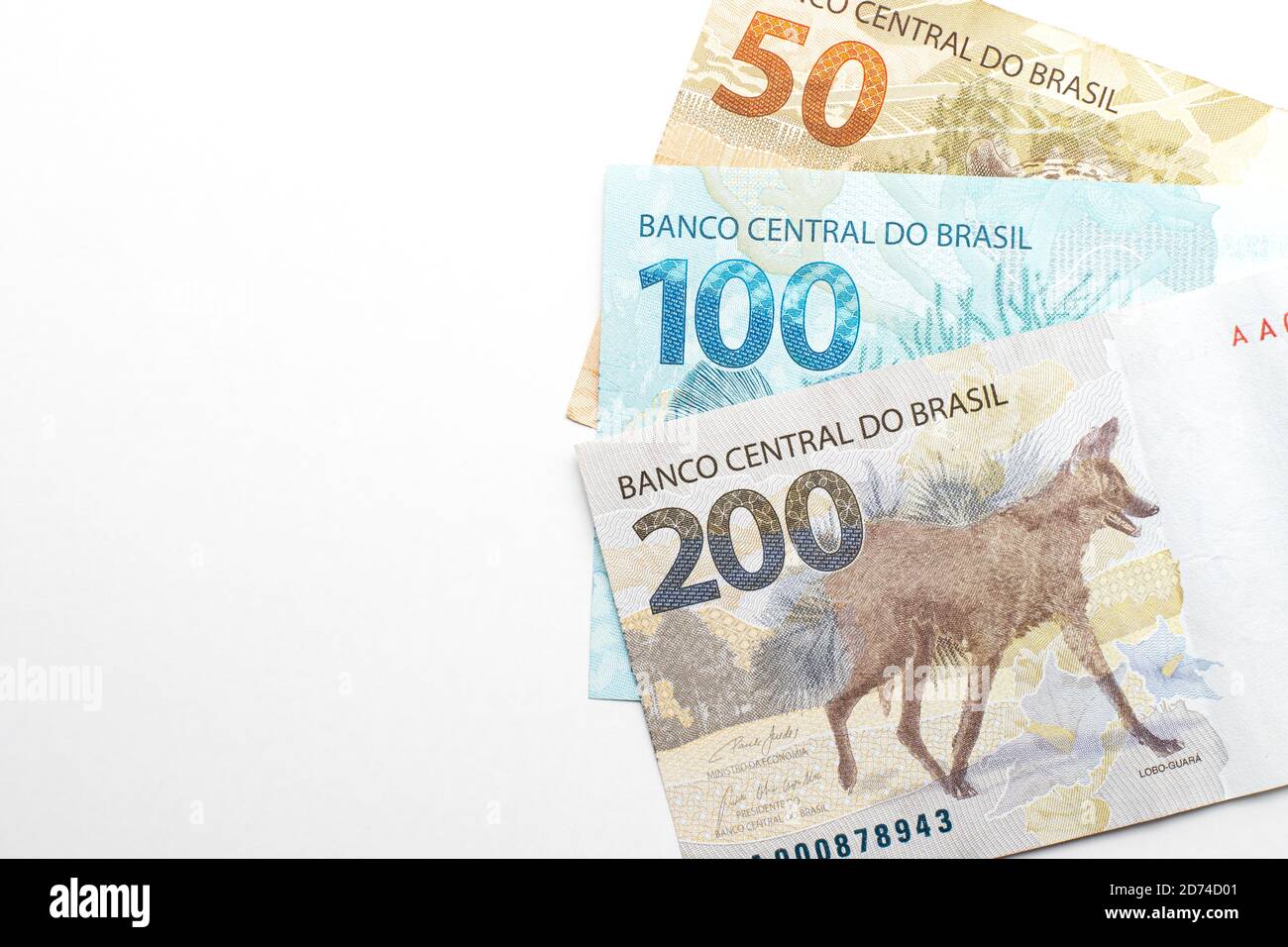 Premium Photo  Brazillian money, man holding 50 reais notes