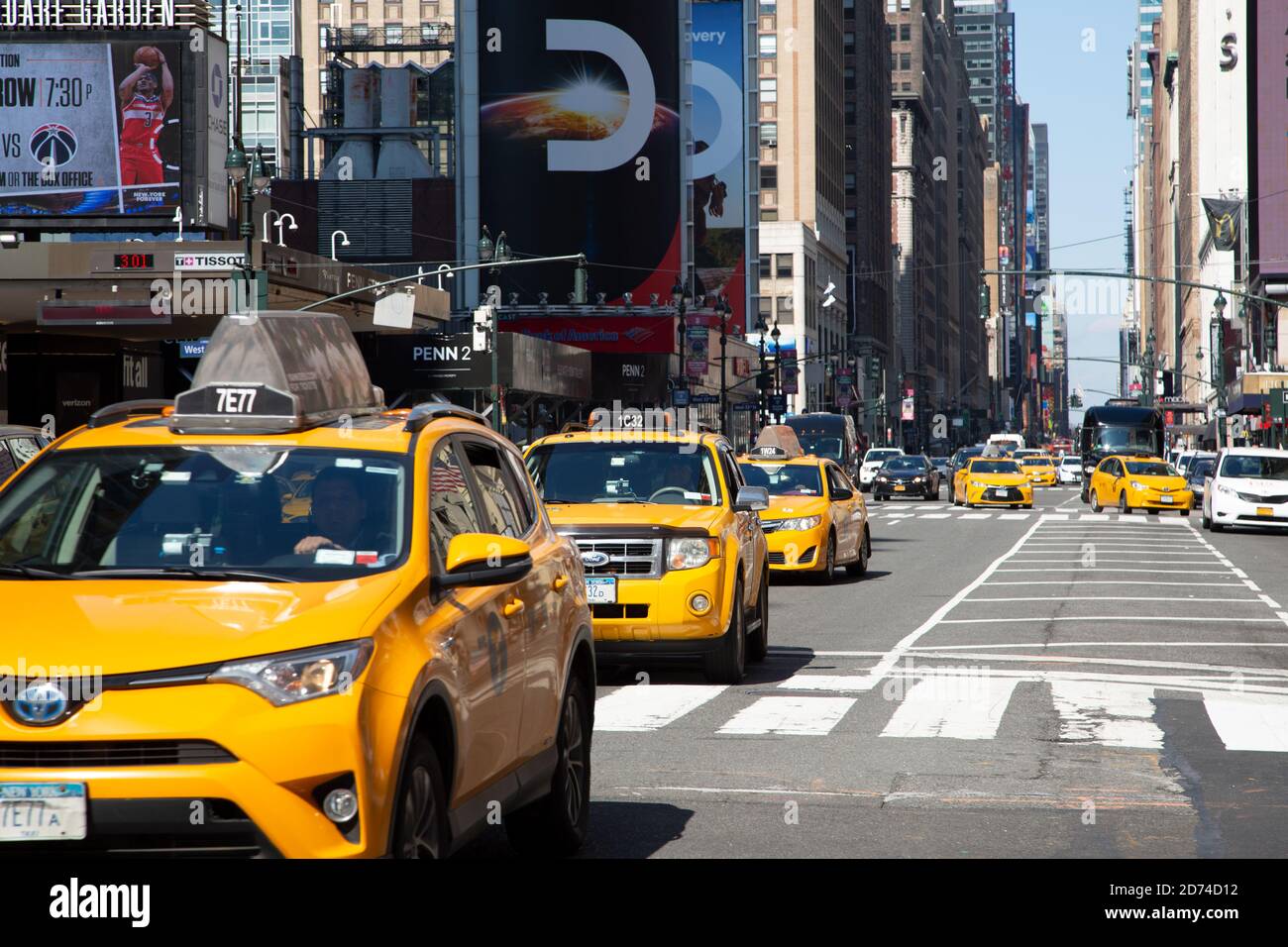 Medallion yellow cabs taxi on Manhattan in New York City Stock Photo