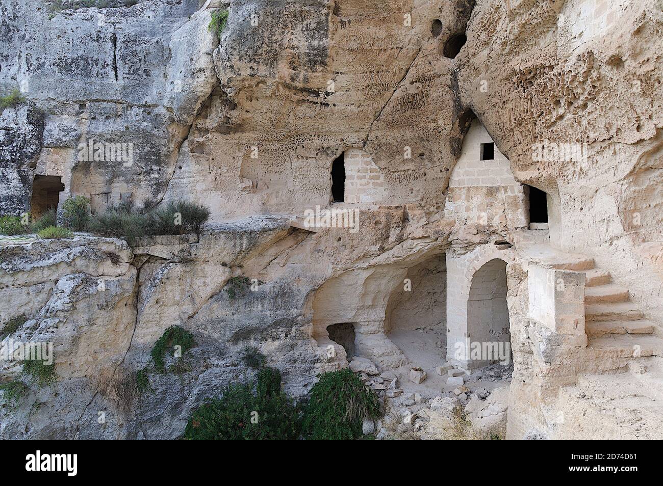 The Ofra complex - Matera is an agglomeration of caves which develops along a rock wall overlooking the Gravina, on four levels communicating through Stock Photo