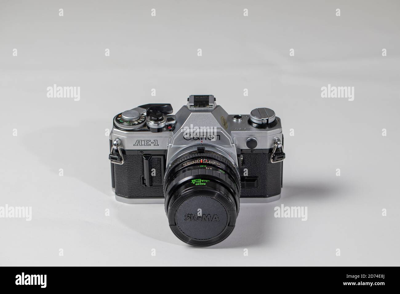 Vintage Canon AE1 film camera with a vintage Sigma 28mm objective mounted on it Stock Photo Alamy