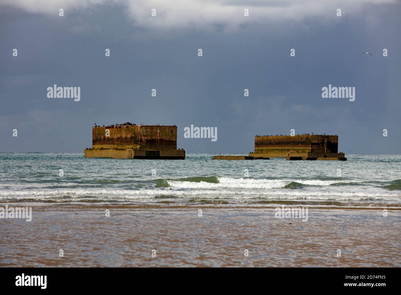 Normandy beach with wracks of the D-Day Stock Photo