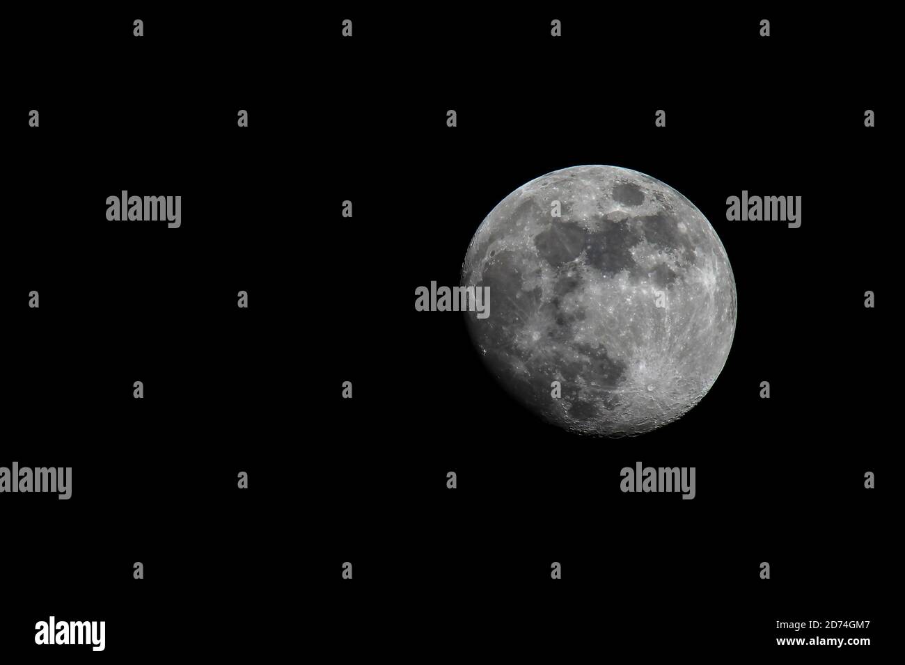 Shot of the full moon on the black background Stock Photo - Alamy