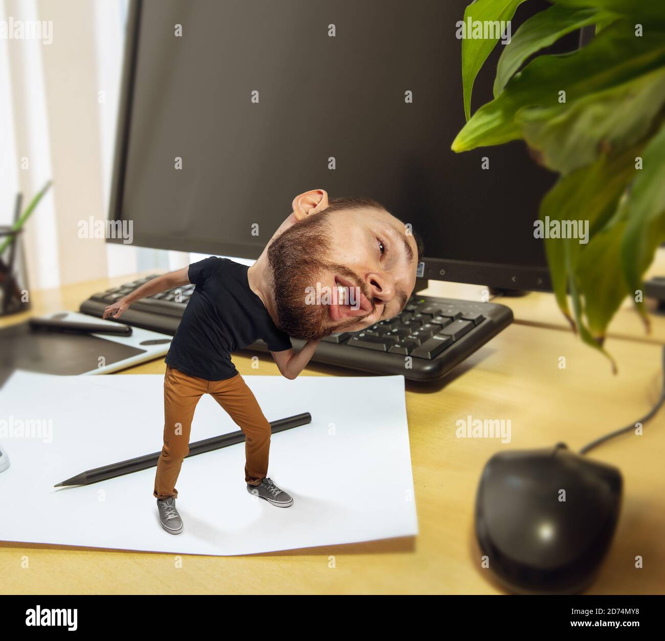 So hard. Tired man, office worker holding his huge tired head, funny. Overworked caucasian man with little body and huge head looks stressed, shocked at big workplace. Concept of work, job, deadline. Stock Photo