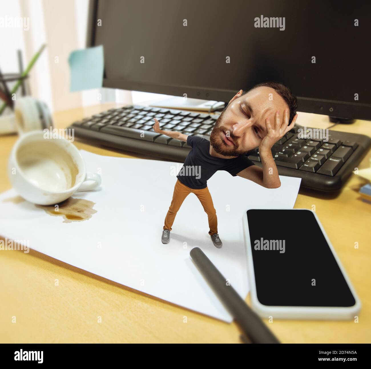 Need more sleep. Tired man, office worker holding his huge tired head, funny. Overworked caucasian man with little body and huge head looks stressed, shocked at big workplace. Concept of work, job, deadline. Stock Photo