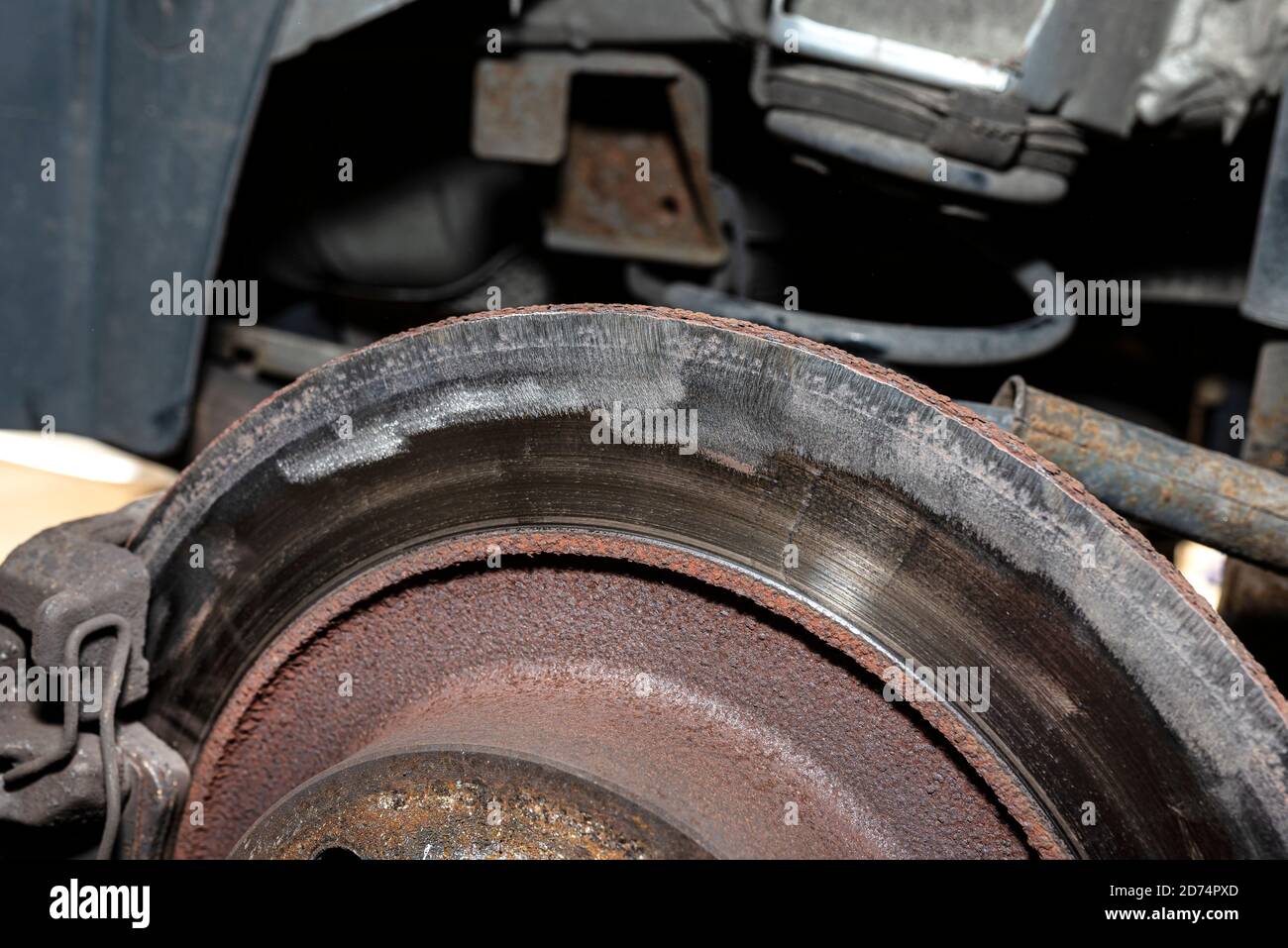 Grinded edge of the old rear brake disc in the car, regeneration of the