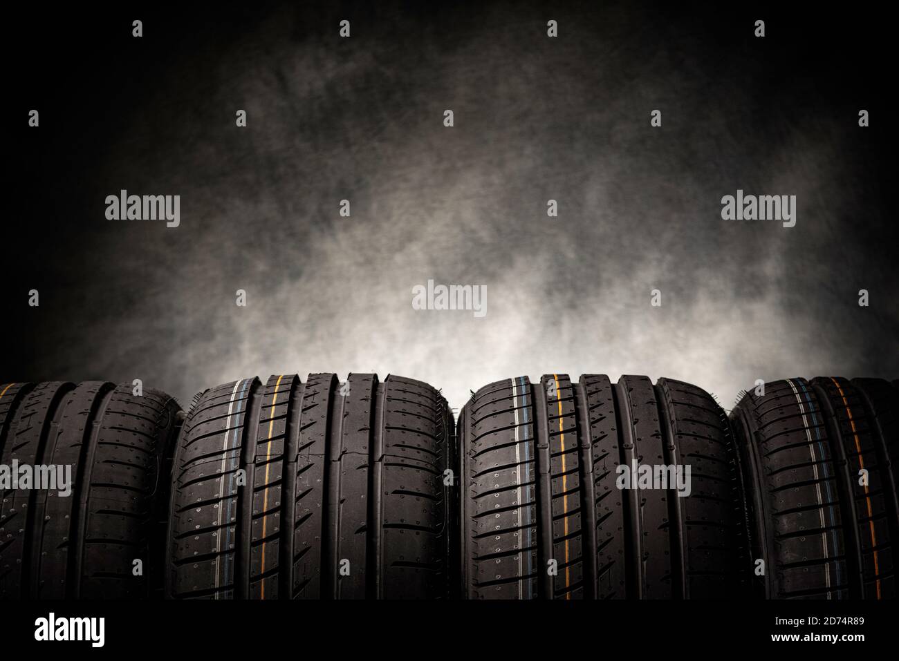 Tire stack background Stock Photo - Alamy