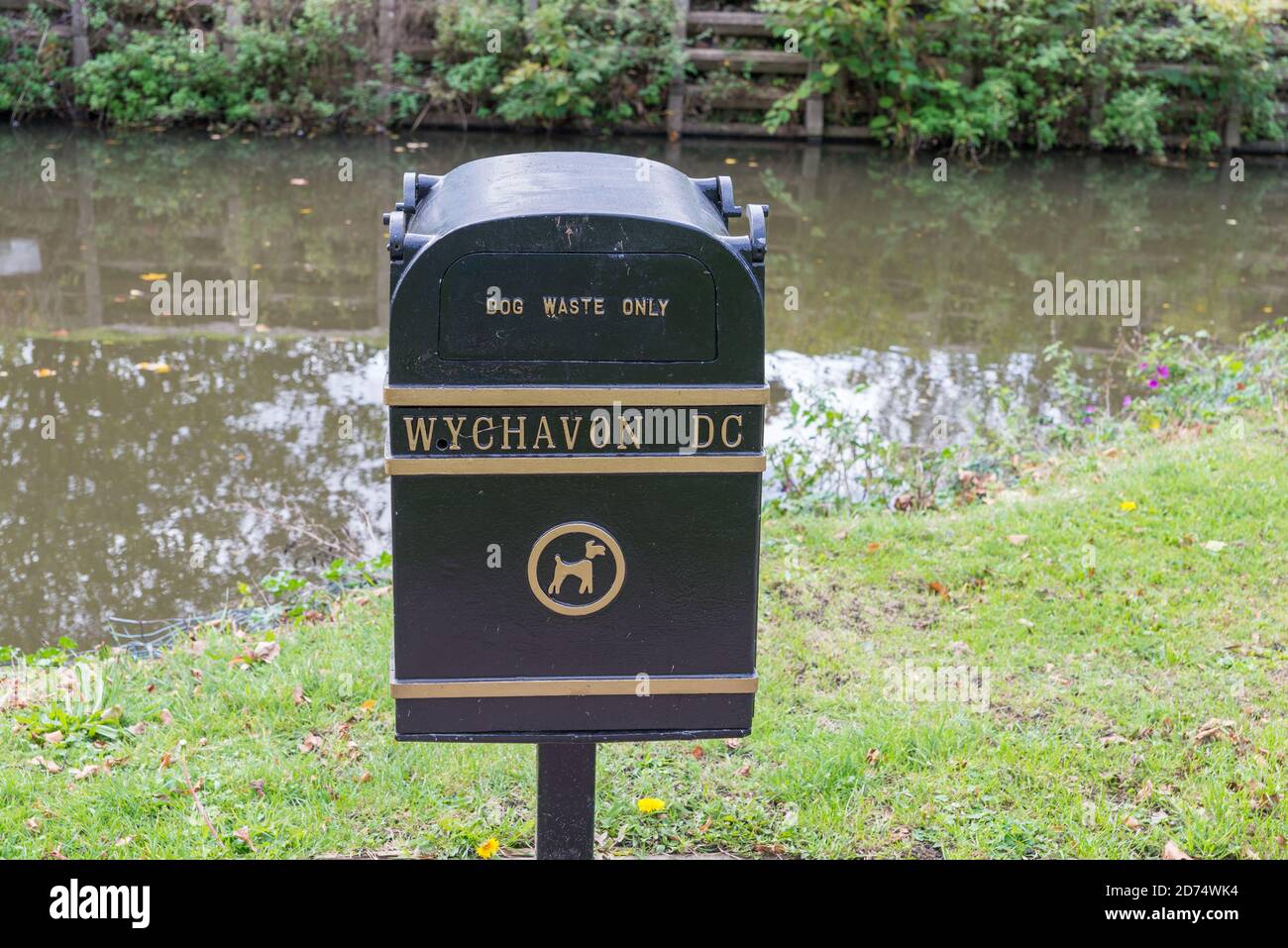 Wychavon District Council dog waste bin in Vines Park in the Worcestershire spa town of Droitwich Stock Photo