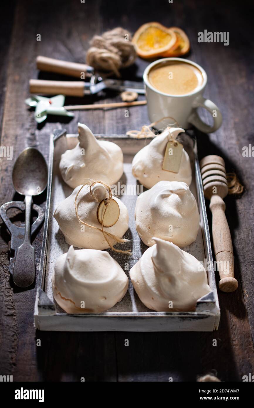 Sweet meringue.Delicious dessert.Healthy food and drink.Vintage style.Winter timer. Stock Photo