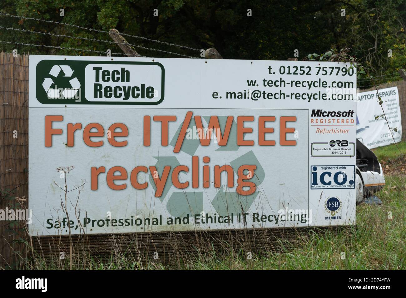 Tech Recycle sign, company providing free IT and WEEE recycling, UK Stock Photo