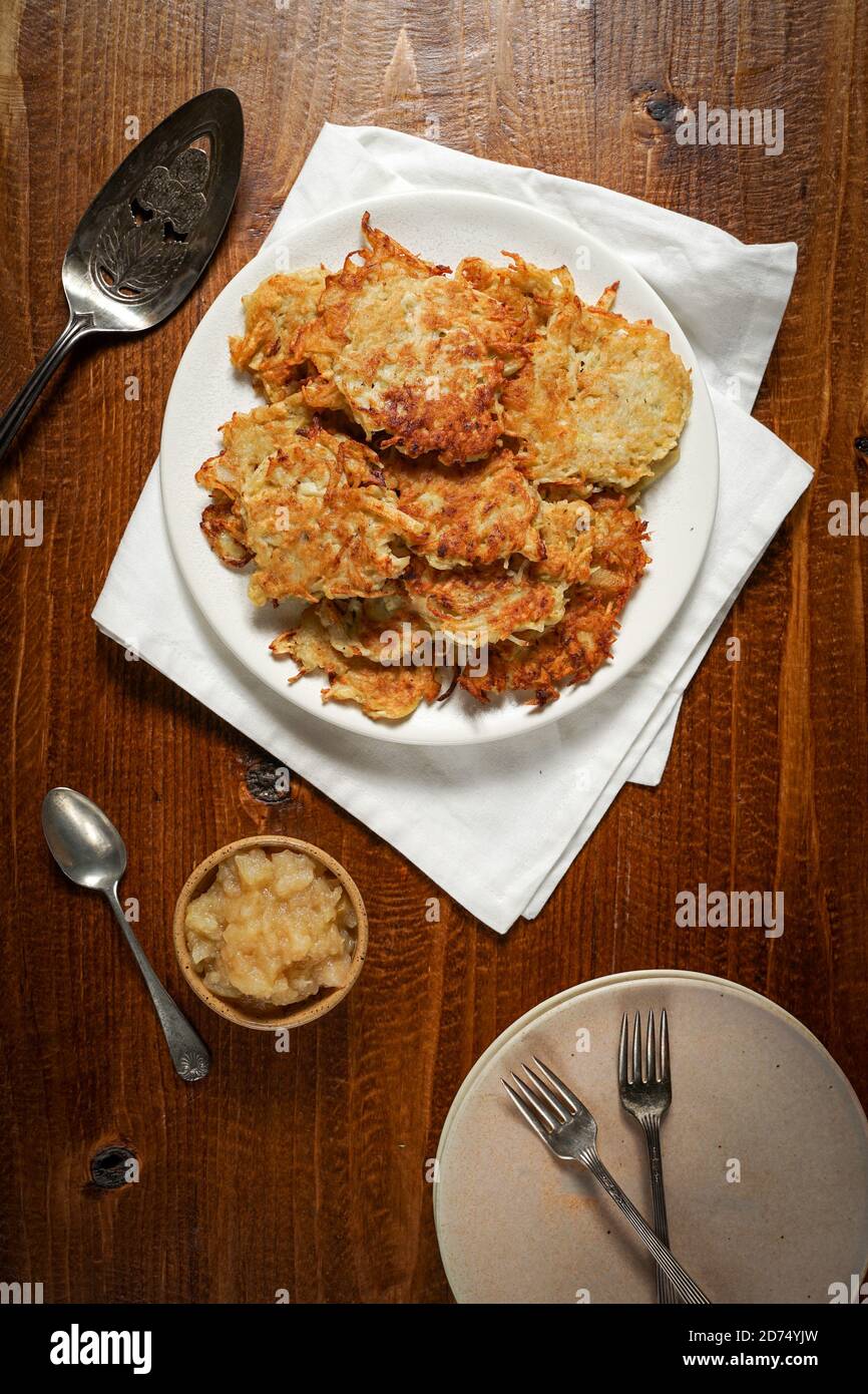 Potato latkes with homemade applesauce Stock Photo Alamy