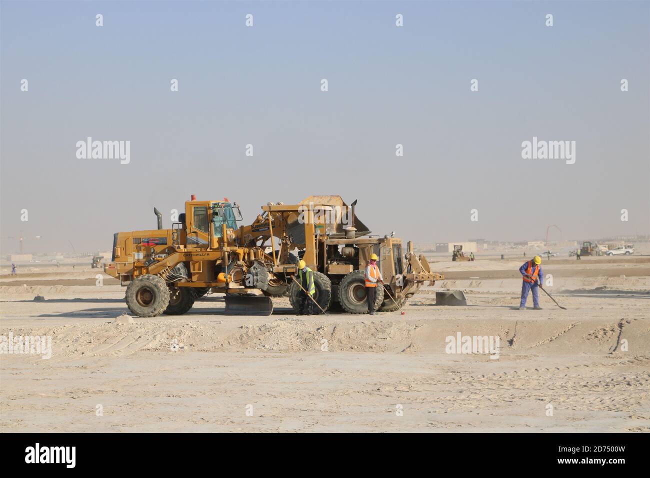Jahra Governorate, Kuwait. 19th Oct, 2020. Construction machines work at the construction site of a project of China Gezhouba Group Corporation (CGGC) in desert of Jahra Governorate, Kuwait, Oct. 19, 2020. China Gezhouba Group Corporation (CGGC) handed over on Tuesday the first batch of its housing infrastructure project to the Kuwaiti side, injecting new momentum into Kuwait's economy and livelihood. Credit: Liu Lianghaoyue/Xinhua/Alamy Live News Stock Photo