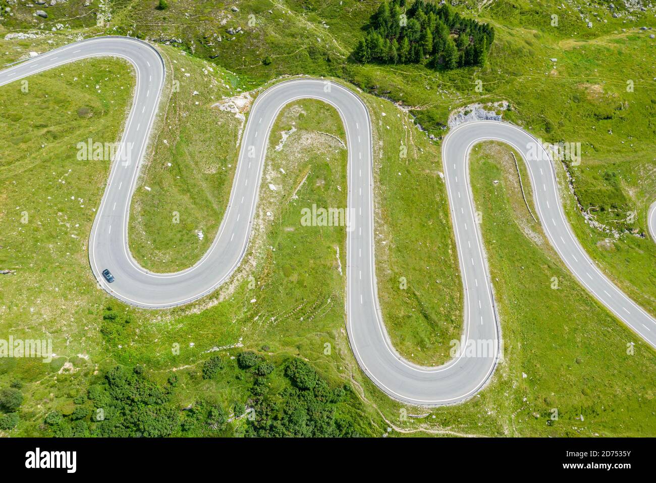 Drone shot,  curves of Julier mountain pass, Switzerland Stock Photo