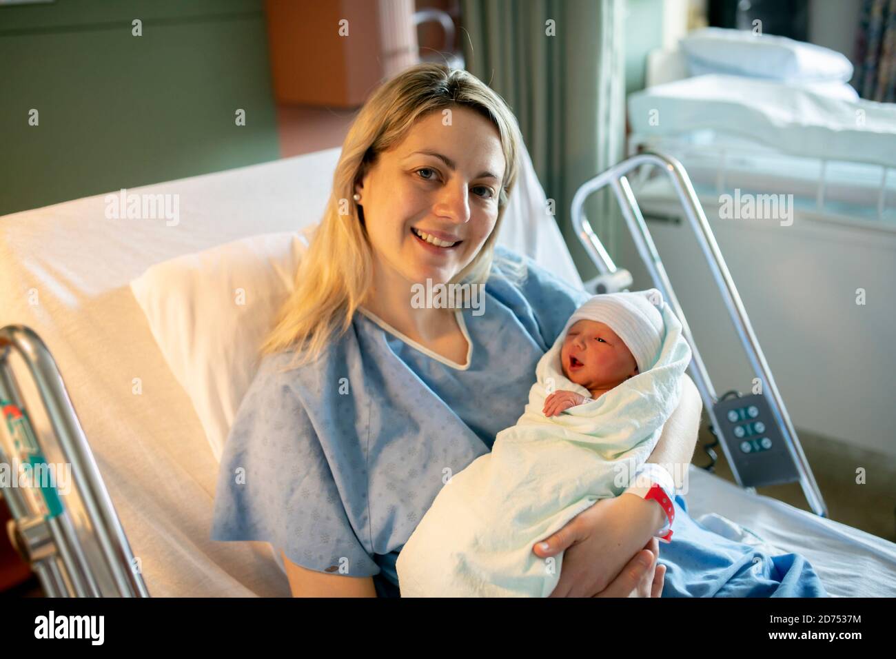 Mother with her newborn baby at the hospital a day after a natural