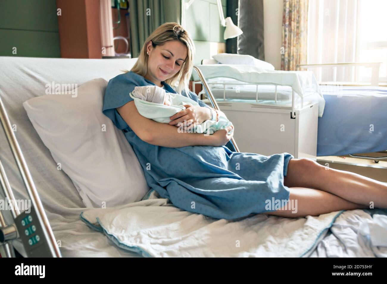 Mother with her newborn baby at the hospital a day after a natural