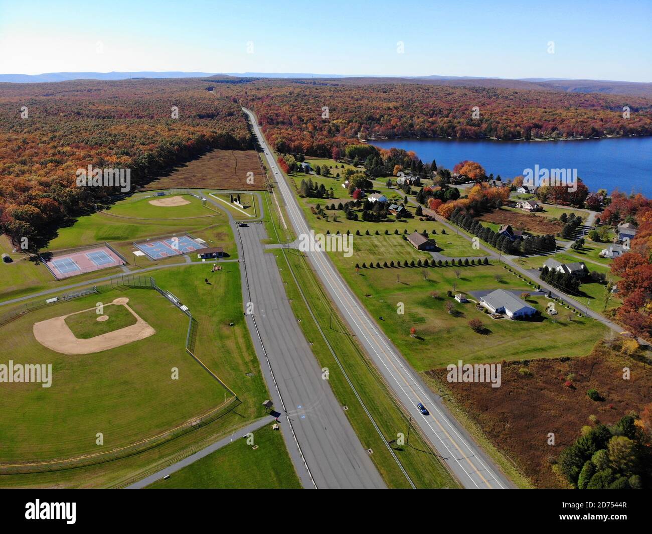 The aerial view of the stunning fall foliage and the Bear Creek Lake on