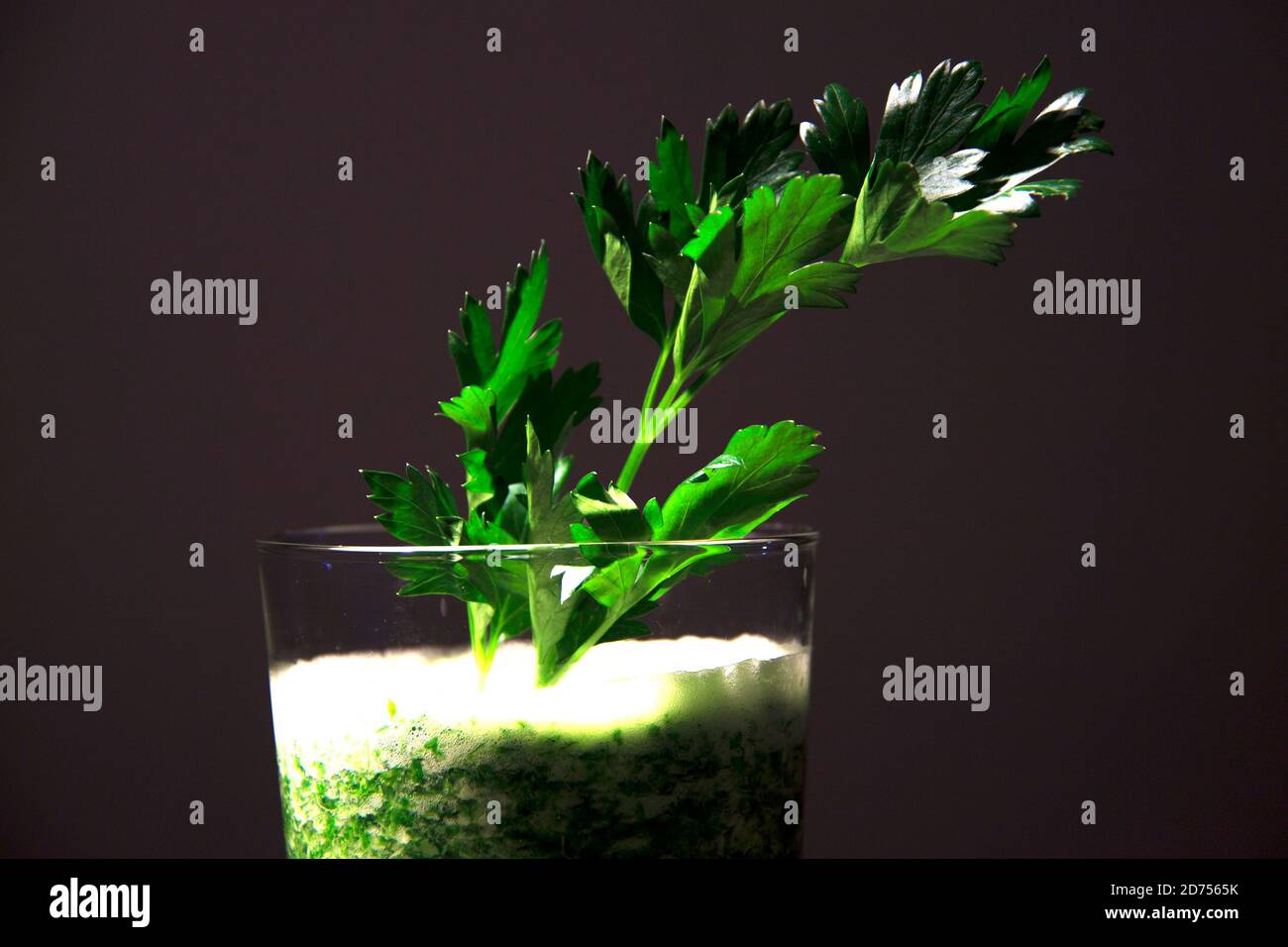 Green detox juice from parsley and lemon Stock Photo